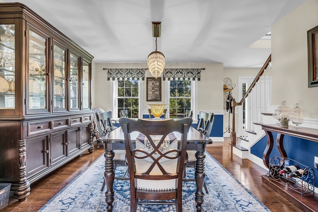 65 Easter Brook Road Lunenburg, MA 01462 - Photo 11 of 39 a view of a dining room with furniture window and wooden floor