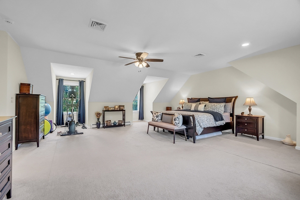 65 Easter Brook Road Lunenburg, MA 01462 - Photo 24 of 39 a bedroom with furniture and a ceiling fan