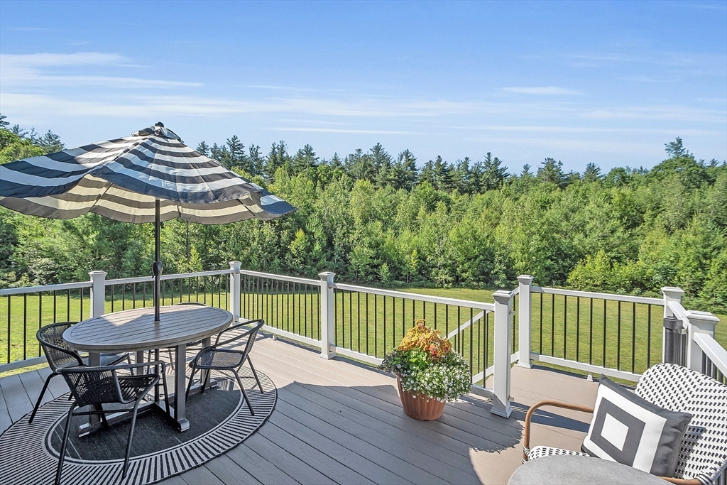 65 Easter Brook Road Lunenburg, MA 01462 - Photo 34 of 39 a view of a chair and table on the deck
