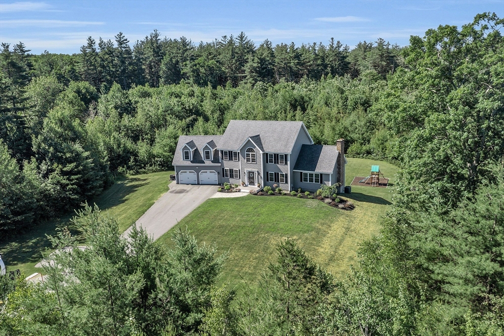 65 Easter Brook Road Lunenburg, MA 01462 - Photo 4 of 39 an aerial view of a house with backyard garden and outdoor seating