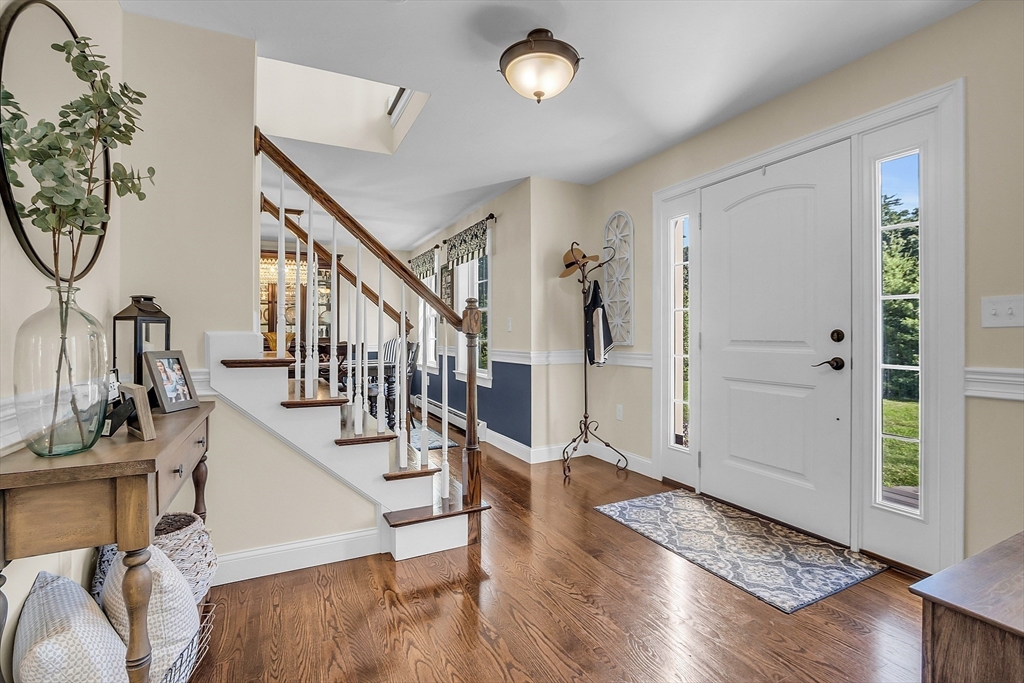 65 Easter Brook Road Lunenburg, MA 01462 - Photo 9 of 39 a view of entryway and hall with wooden floor