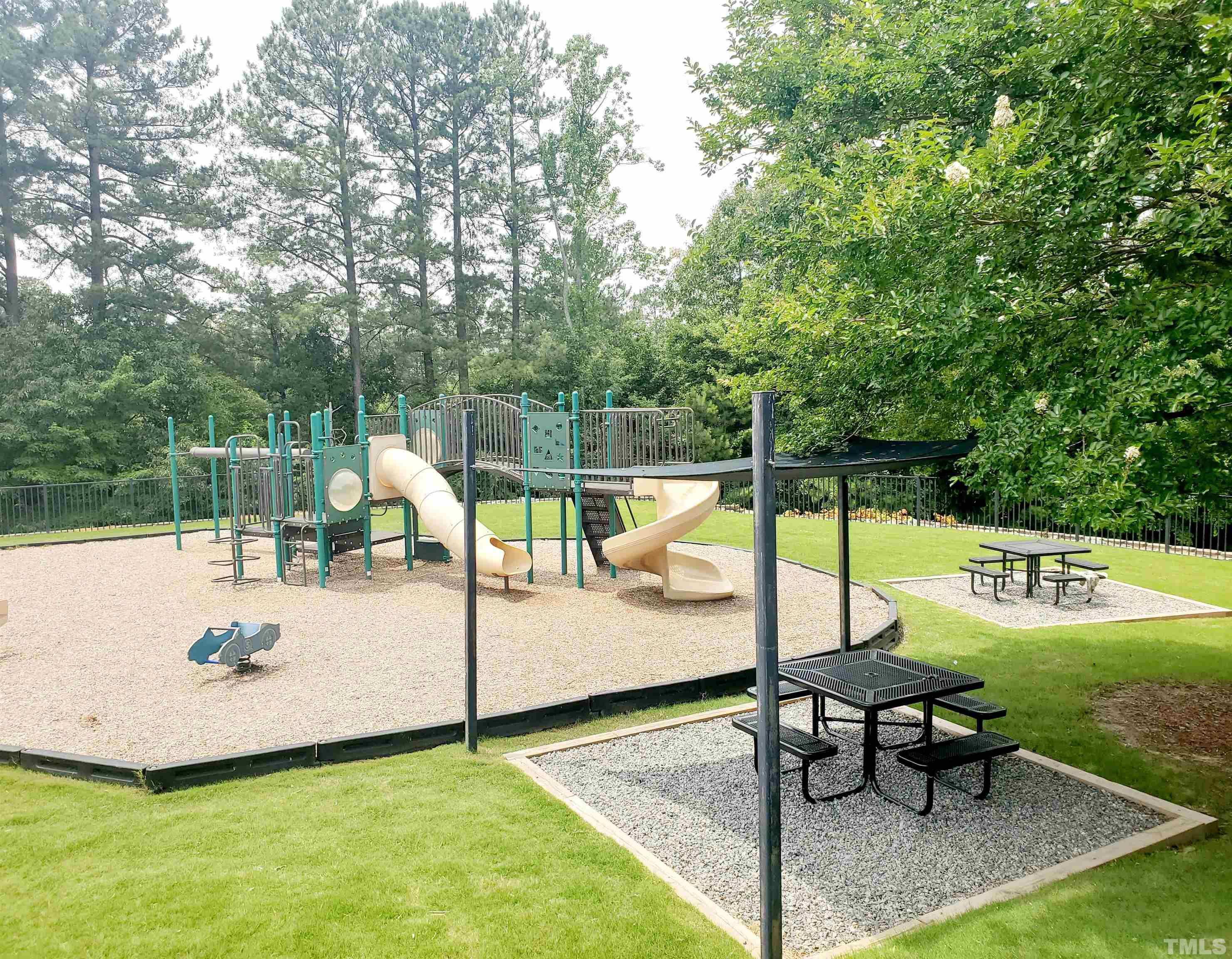 7236 Galon Glen Road Raleigh, NC 27613 - Photo 3 of 24 a view of a swimming pool with a patio