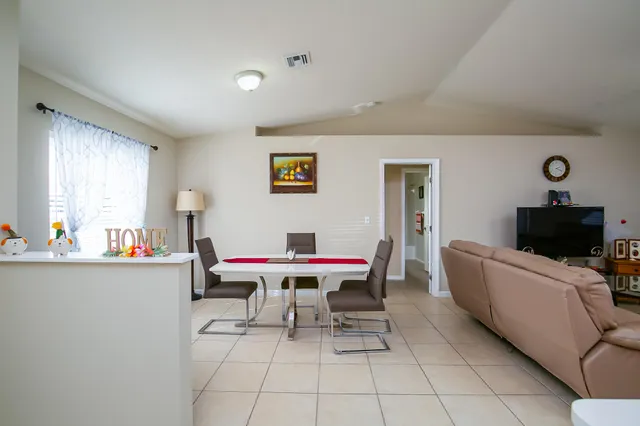 a workspace with furniture and window