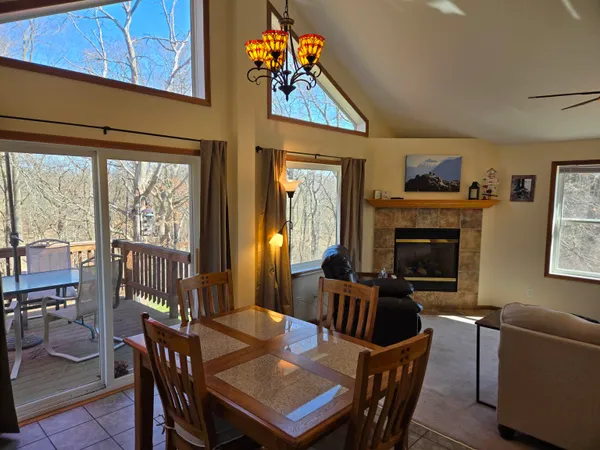 a view of a livingroom with furniture and a fireplace