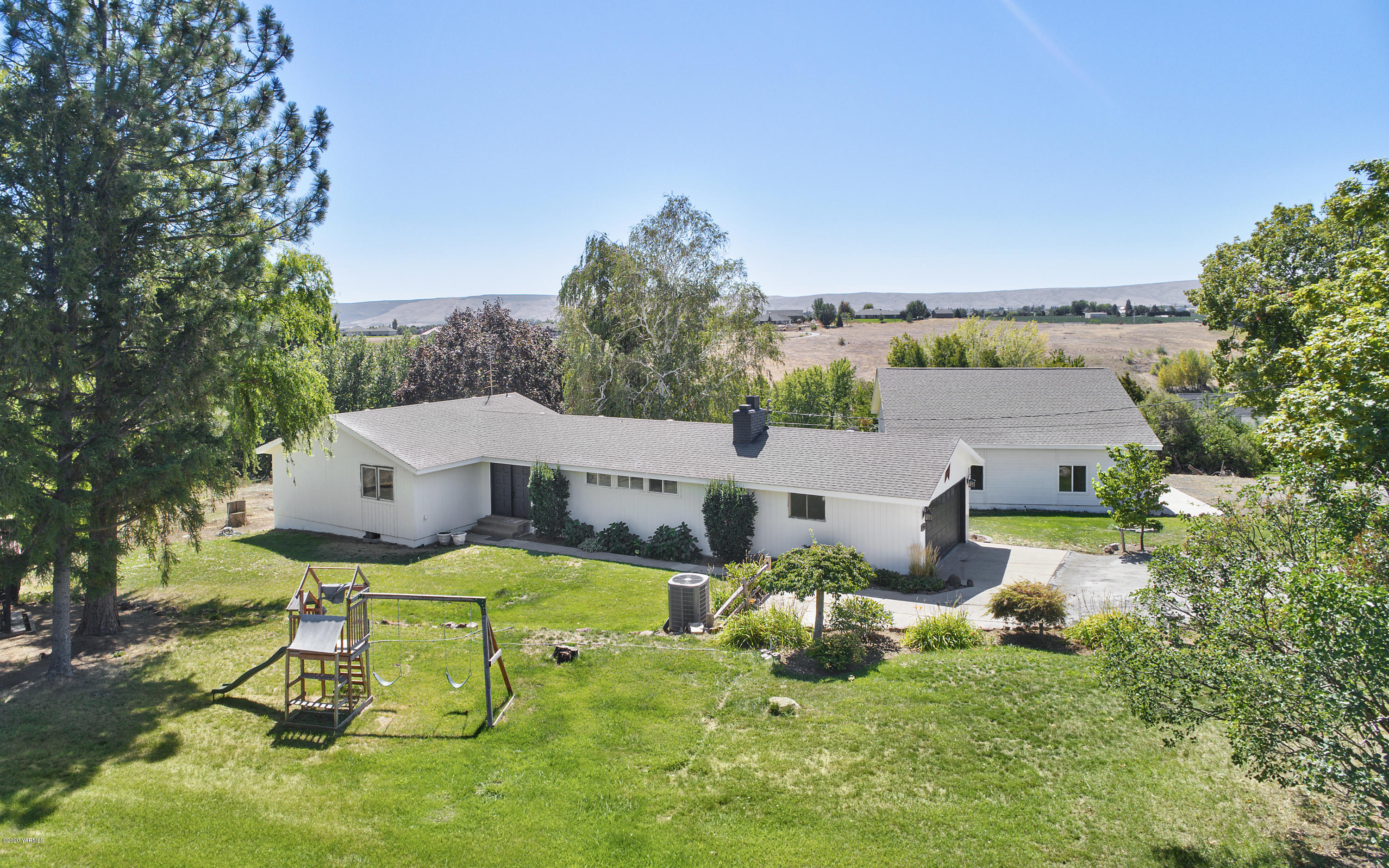 12306 Summitview Ext Road Yakima, WA 98908 - Photo 3 of 30 an aerial view of a house with swimming pool and garden