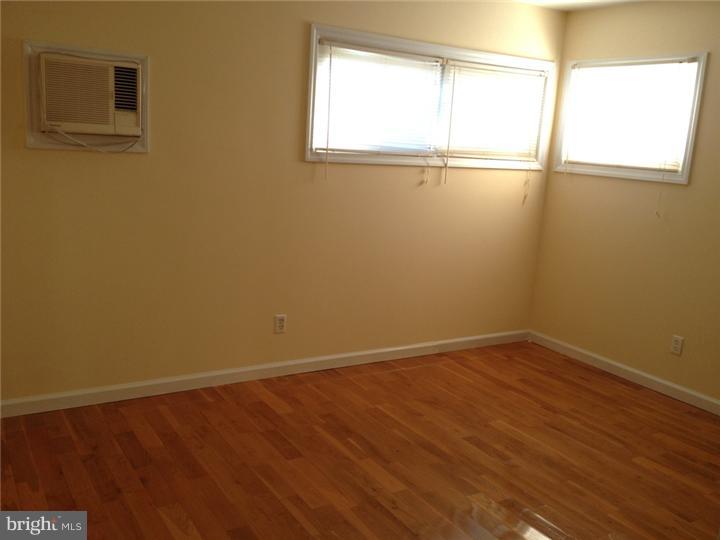 28 Comstock Road Edison, NJ 08817 - Photo 16 of 18 a view of an empty room with a window
