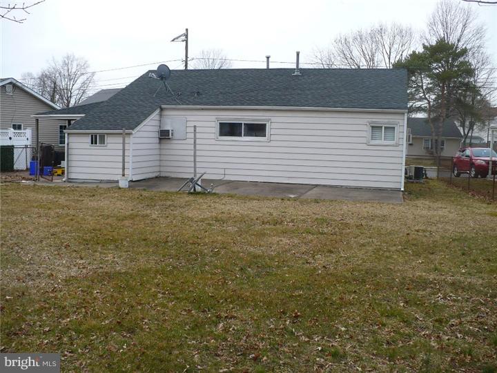 28 Comstock Road Edison, NJ 08817 - Photo 17 of 18 a view of a house with a yard
