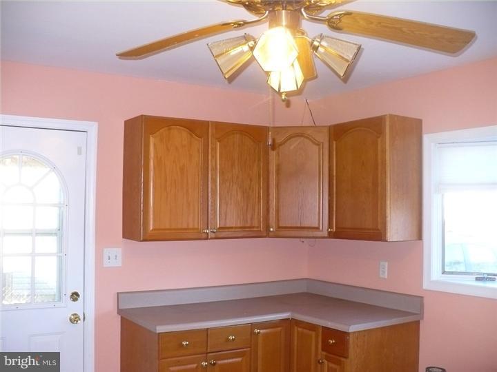 28 Comstock Road Edison, NJ 08817 - Photo 4 of 18 a bathroom with a sink and a mirror