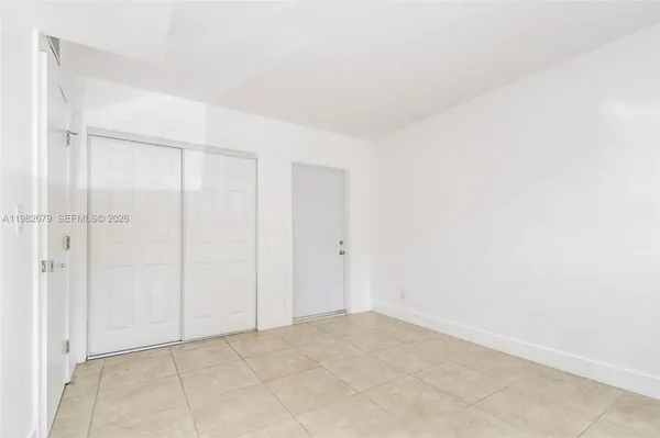 an empty room with a workbench