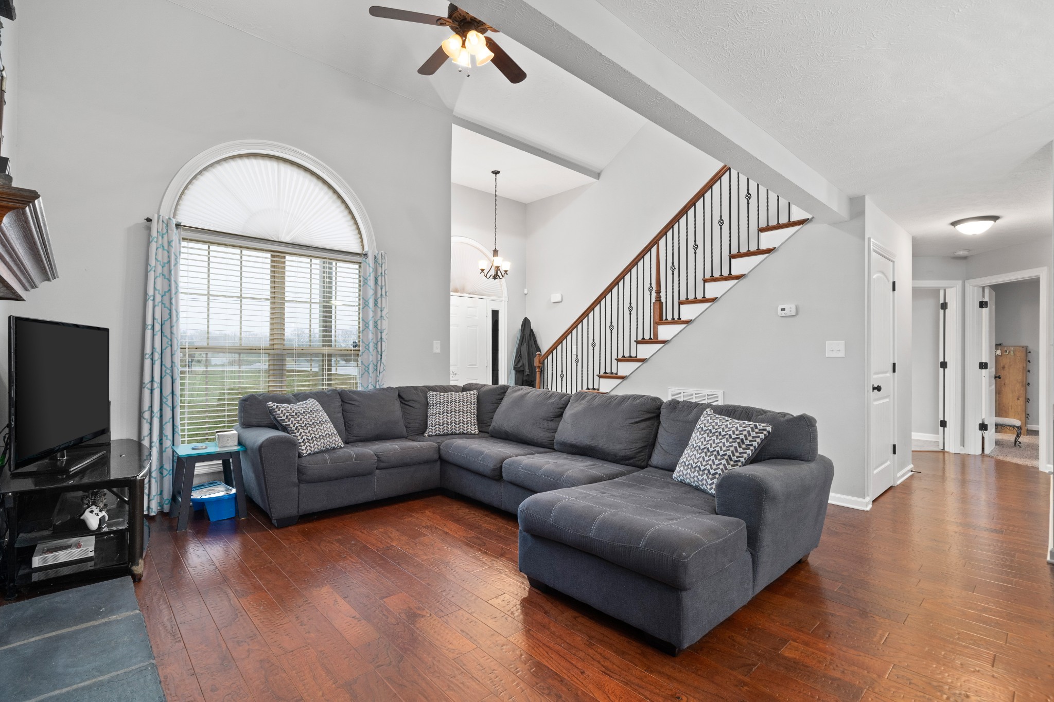 4218 Station Road Cunningham, TN 37052 - Photo 13 of 32 a living room with furniture fireplace and a flat screen tv