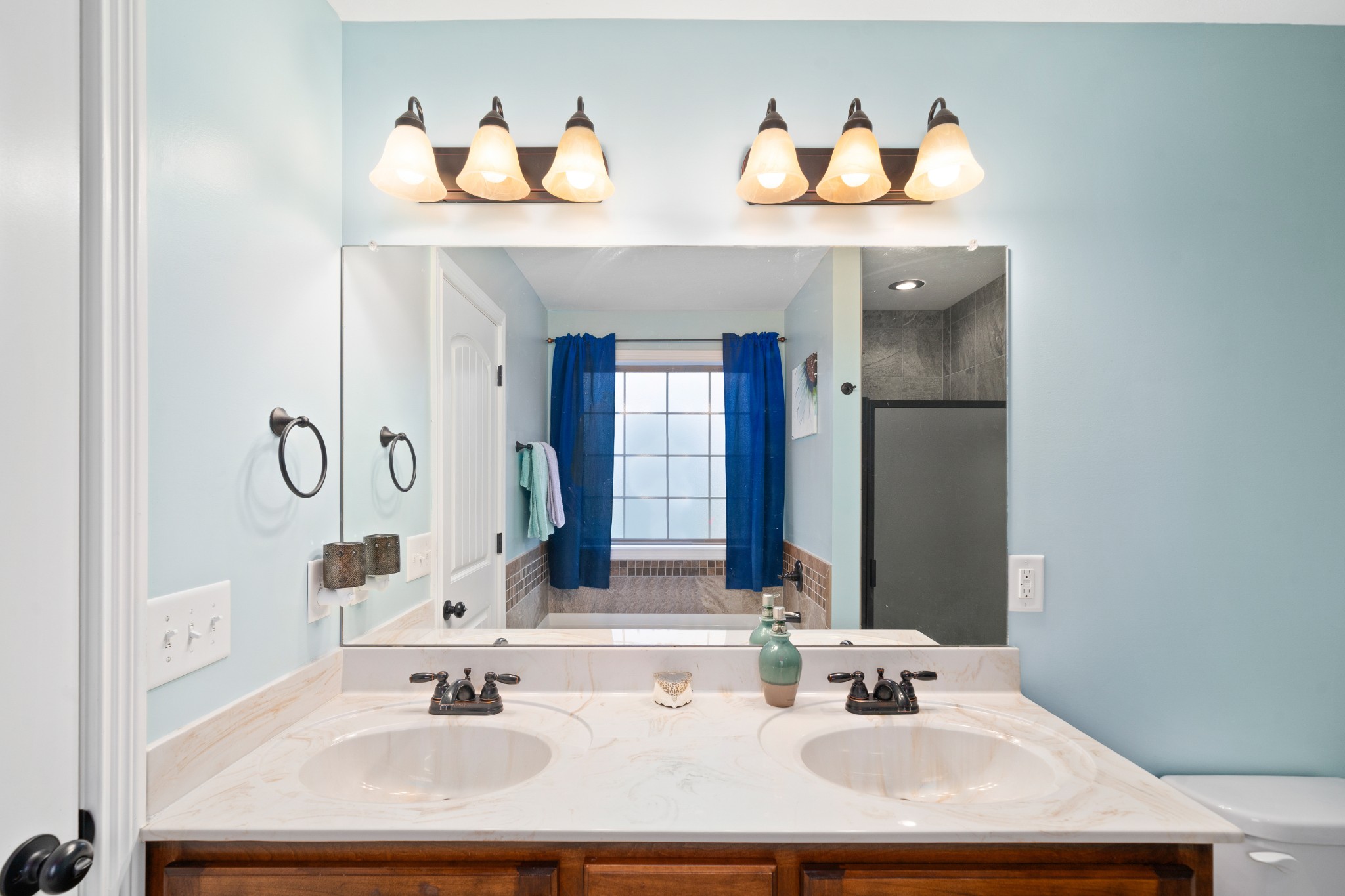 4218 Station Road Cunningham, TN 37052 - Photo 20 of 32 a bathroom with a sink and a mirror