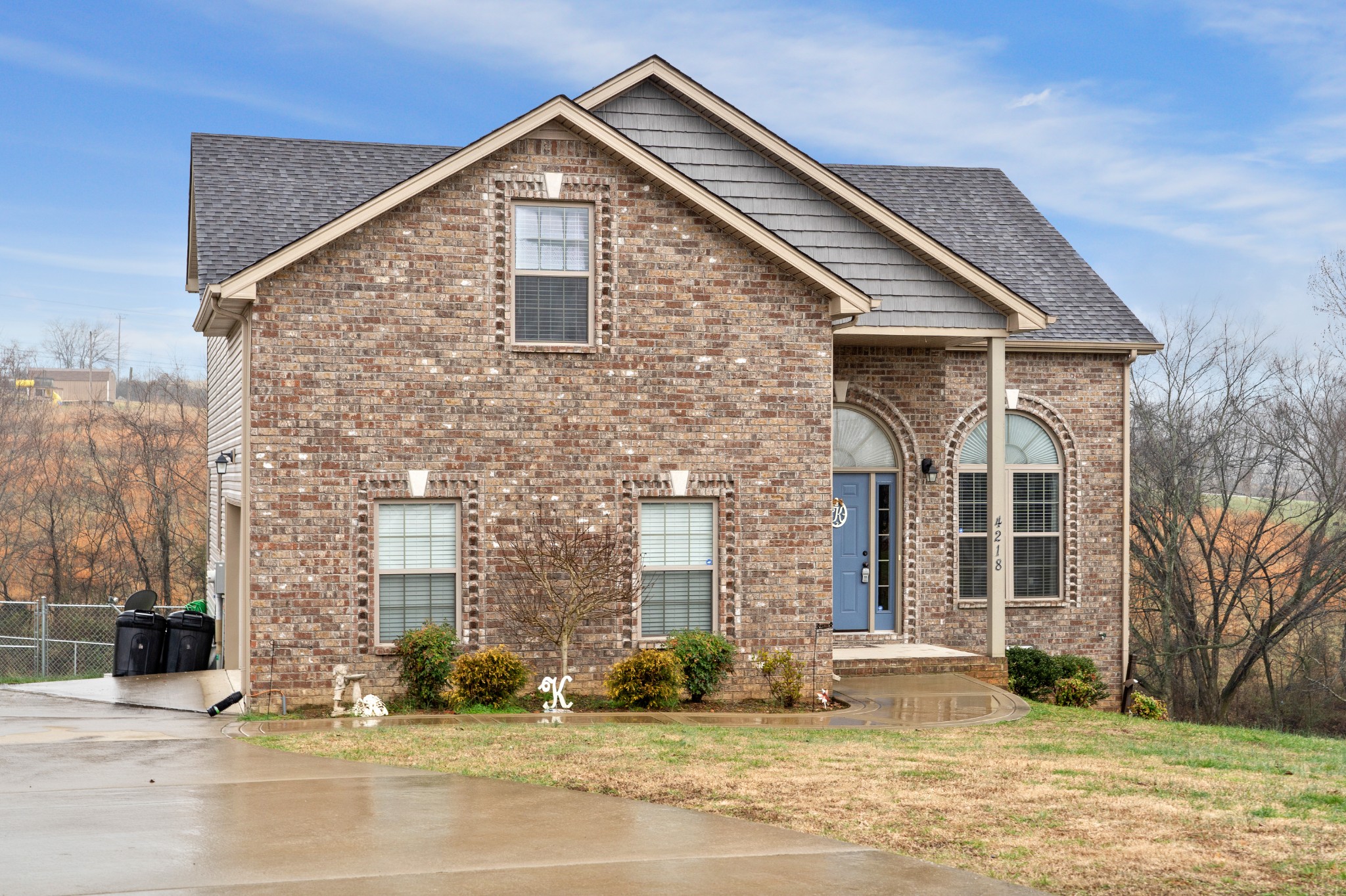 4218 Station Road Cunningham, TN 37052 - Photo 3 of 32 a front view of a house with a yard