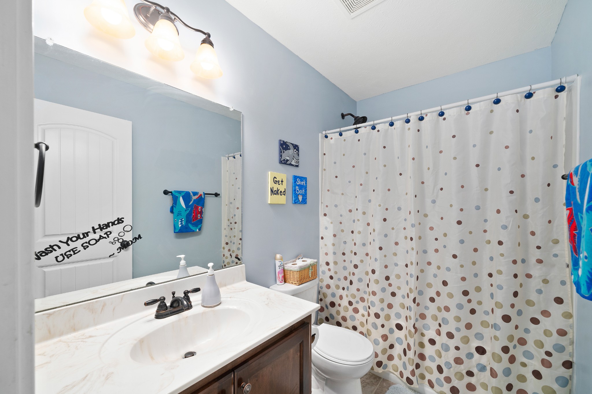4218 Station Road Cunningham, TN 37052 - Photo 23 of 32 a bathroom with a sink toilet and shower
