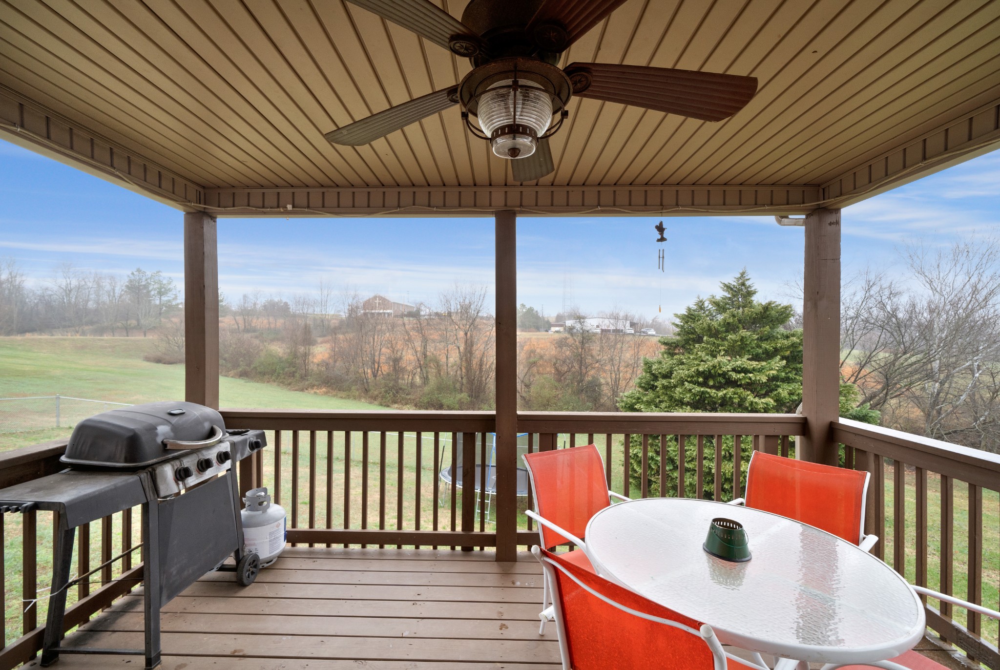 4218 Station Road Cunningham, TN 37052 - Photo 29 of 32 a balcony with furniture and a potted plant