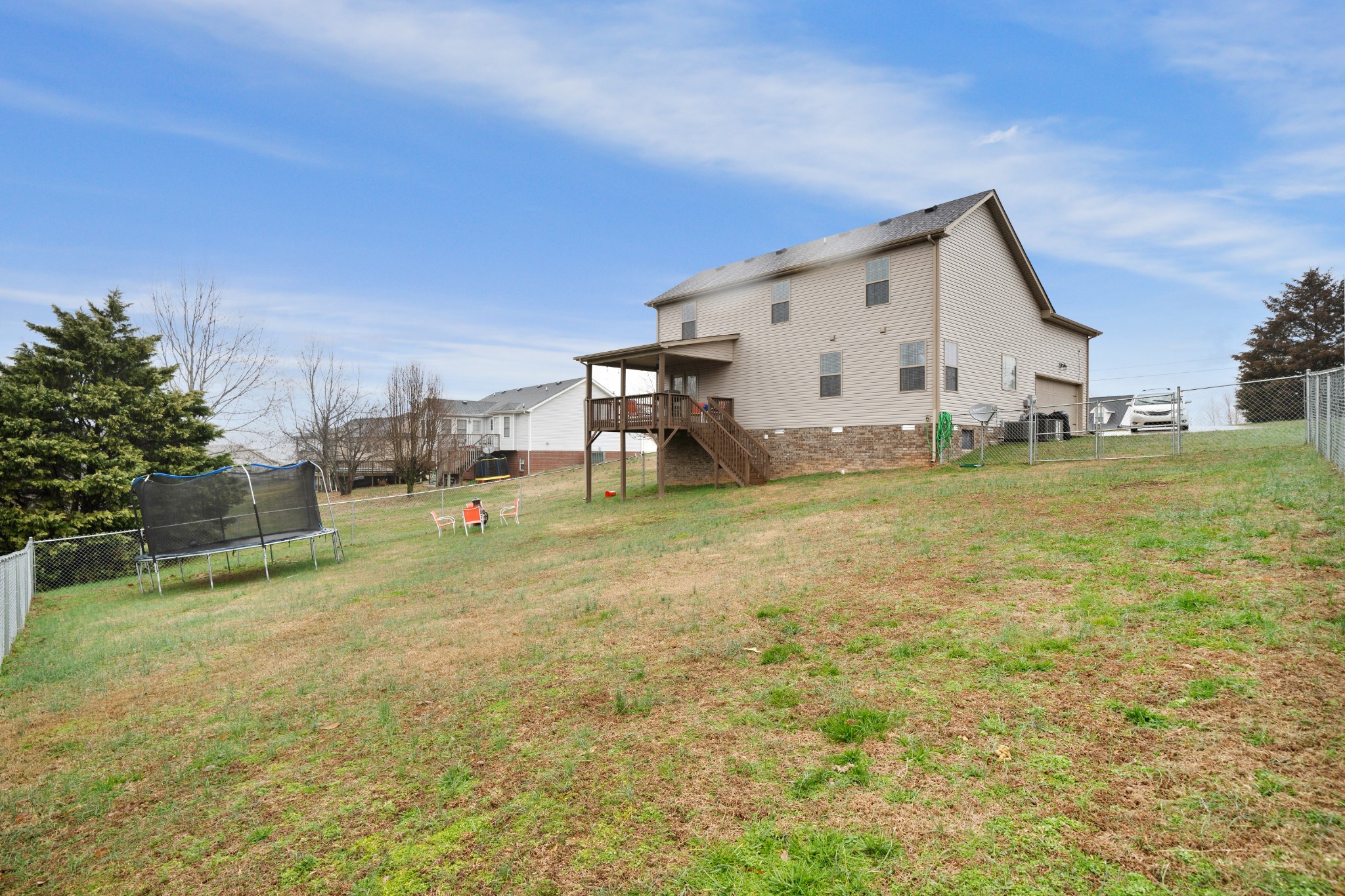 4218 Station Road Cunningham, TN 37052 - Photo 31 of 32 a view of a house with backyard and sitting area