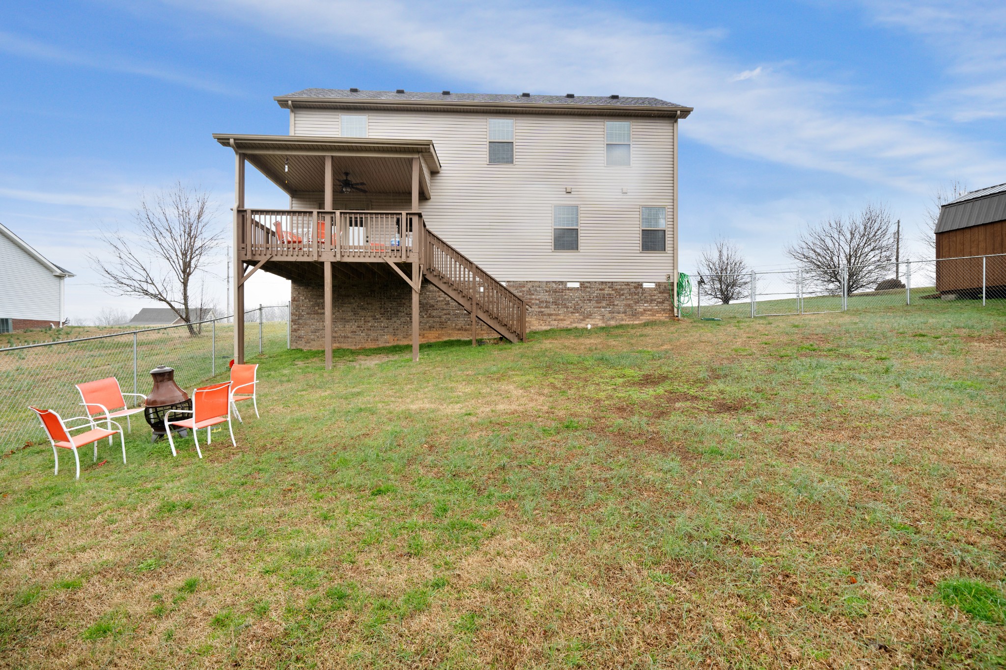 4218 Station Road Cunningham, TN 37052 - Photo 32 of 32 a view of a house with backyard porch and sitting area