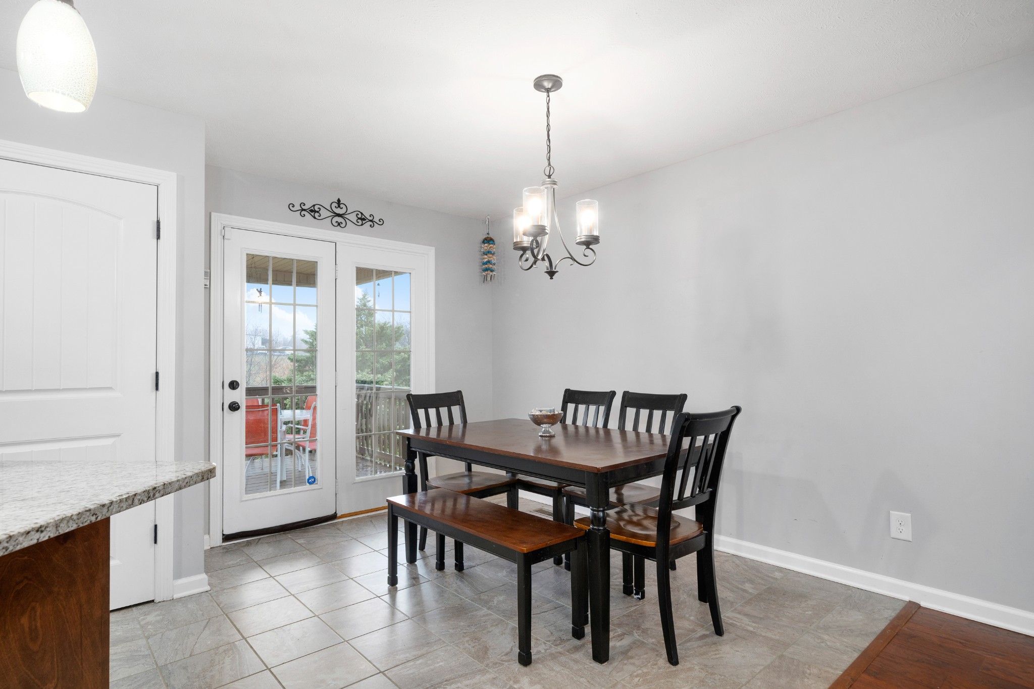 4218 Station Road Cunningham, TN 37052 - Photo 10 of 32 a view of a dining room with furniture and chandelier