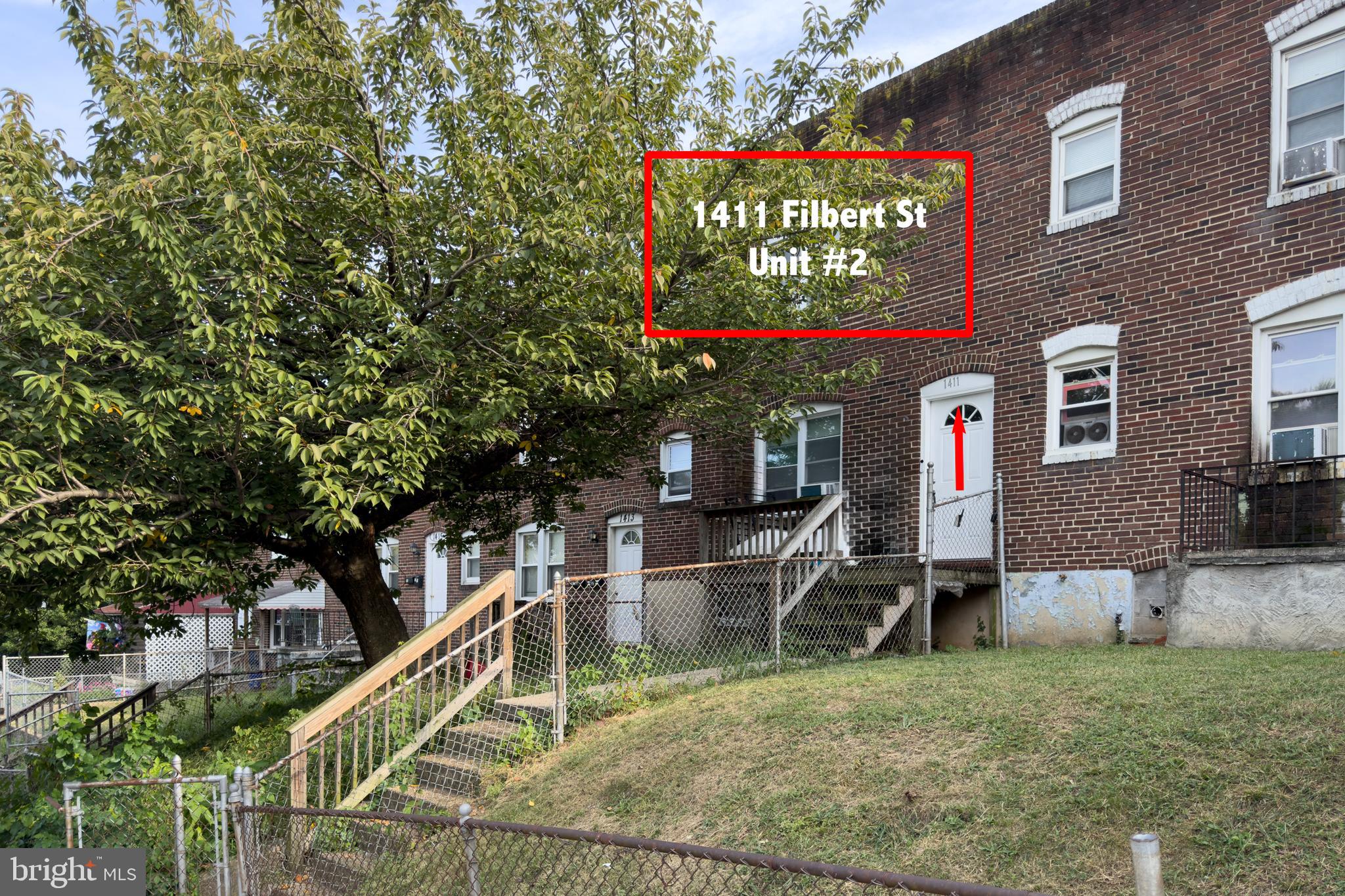 1411 Filbert Street, Unit 2 Curtis Bay, MD 21226 - Photo 1 of 13 a sign that is on the side of a building