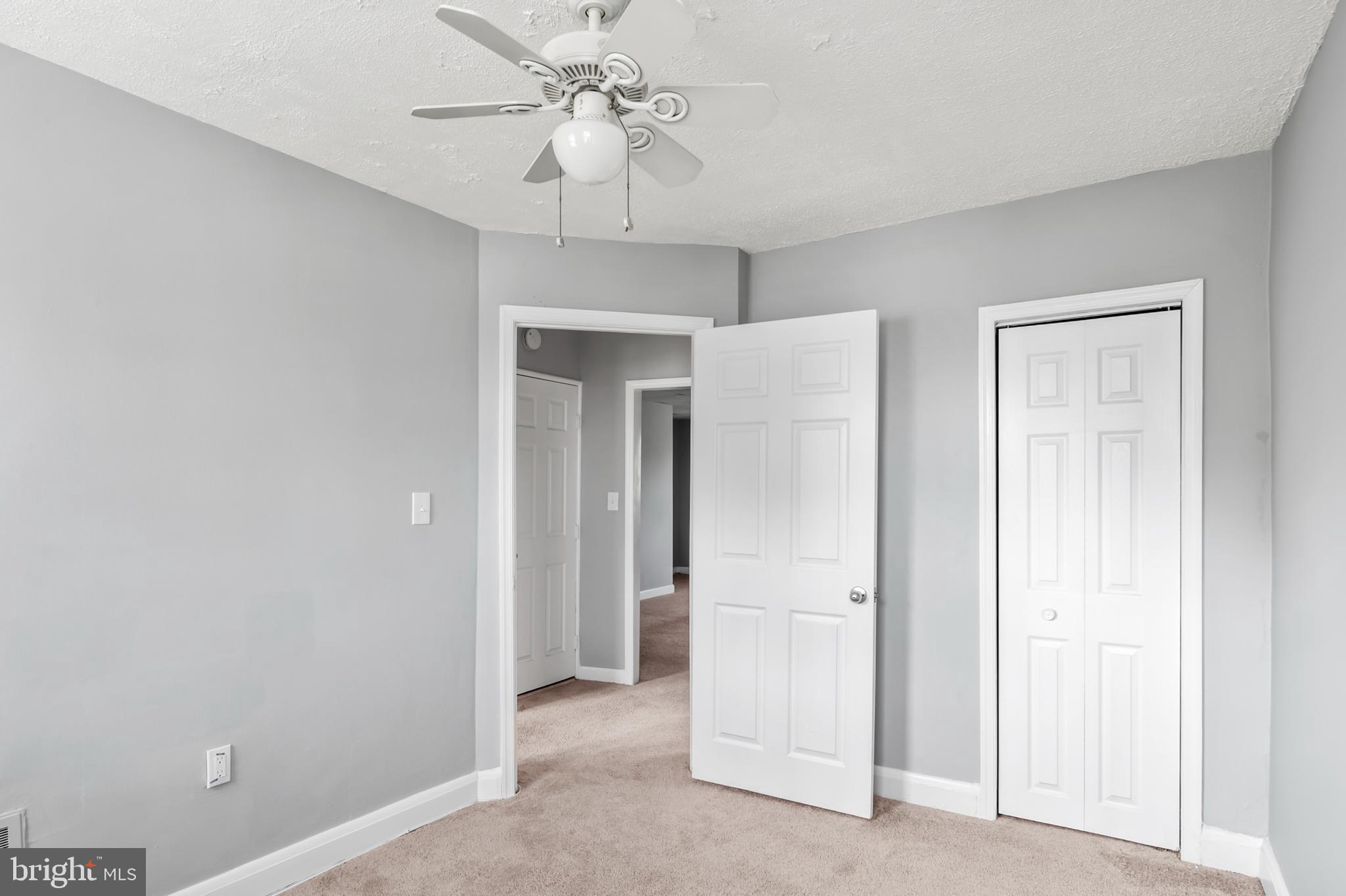 1411 Filbert Street, Unit 2 Curtis Bay, MD 21226 - Photo 9 of 13 a view of a livingroom with a chandelier fan