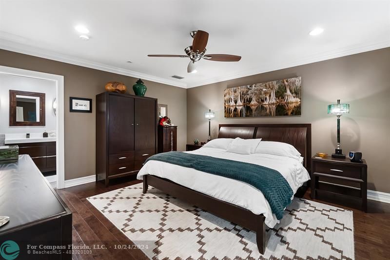 301 Tarpon Drive Fort Lauderdale, FL 33301 - Photo 11 of 21 a bedroom with a bed and a dresser