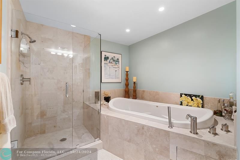 301 Tarpon Drive Fort Lauderdale, FL 33301 - Photo 14 of 21 a bathroom with a bathtub and a shower