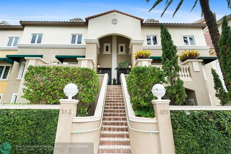 301 Tarpon Drive Fort Lauderdale, FL 33301 - Photo 21 of 21 a front view of a house with a garden