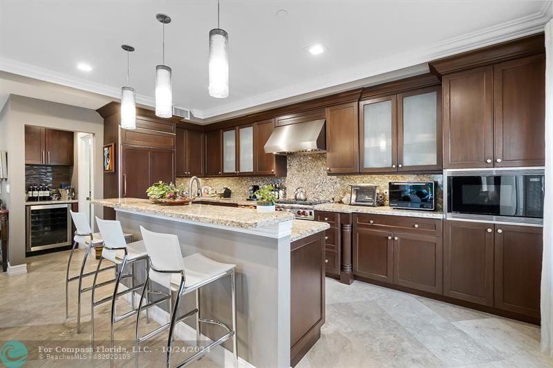 301 Tarpon Drive Fort Lauderdale, FL 33301 - Photo 3 of 21 a kitchen with a sink cabinets and window