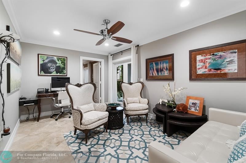 301 Tarpon Drive Fort Lauderdale, FL 33301 - Photo 6 of 21 a living room with furniture a rug and a window