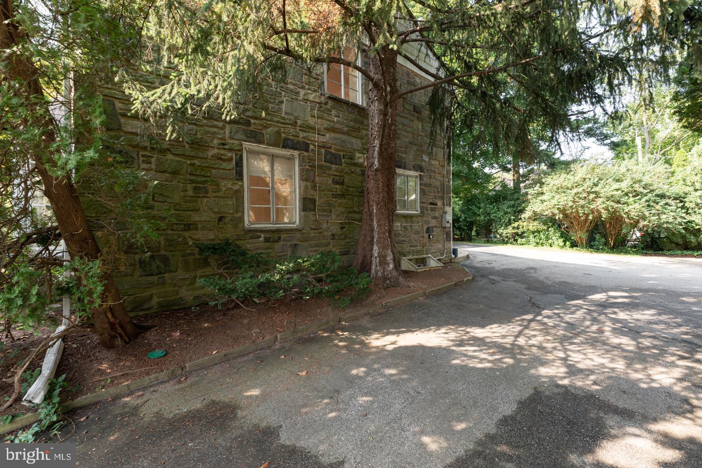 622 Greythorne Road Wynnewood, PA 19096 - Photo 47 of 50 Side of House Going Up The Driveway Towards Garage