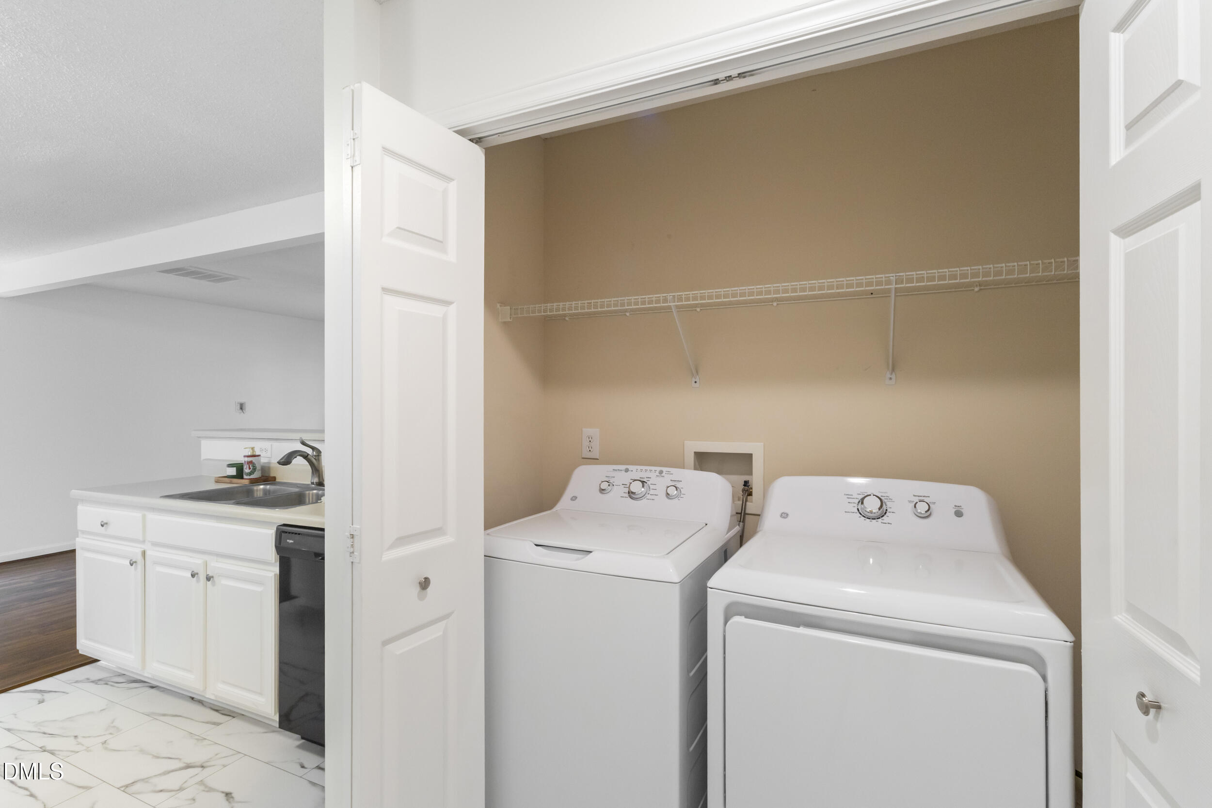 4616 Silverdene Street Raleigh, NC 27616 - Photo 18 of 42 a utility room with dryer and washer