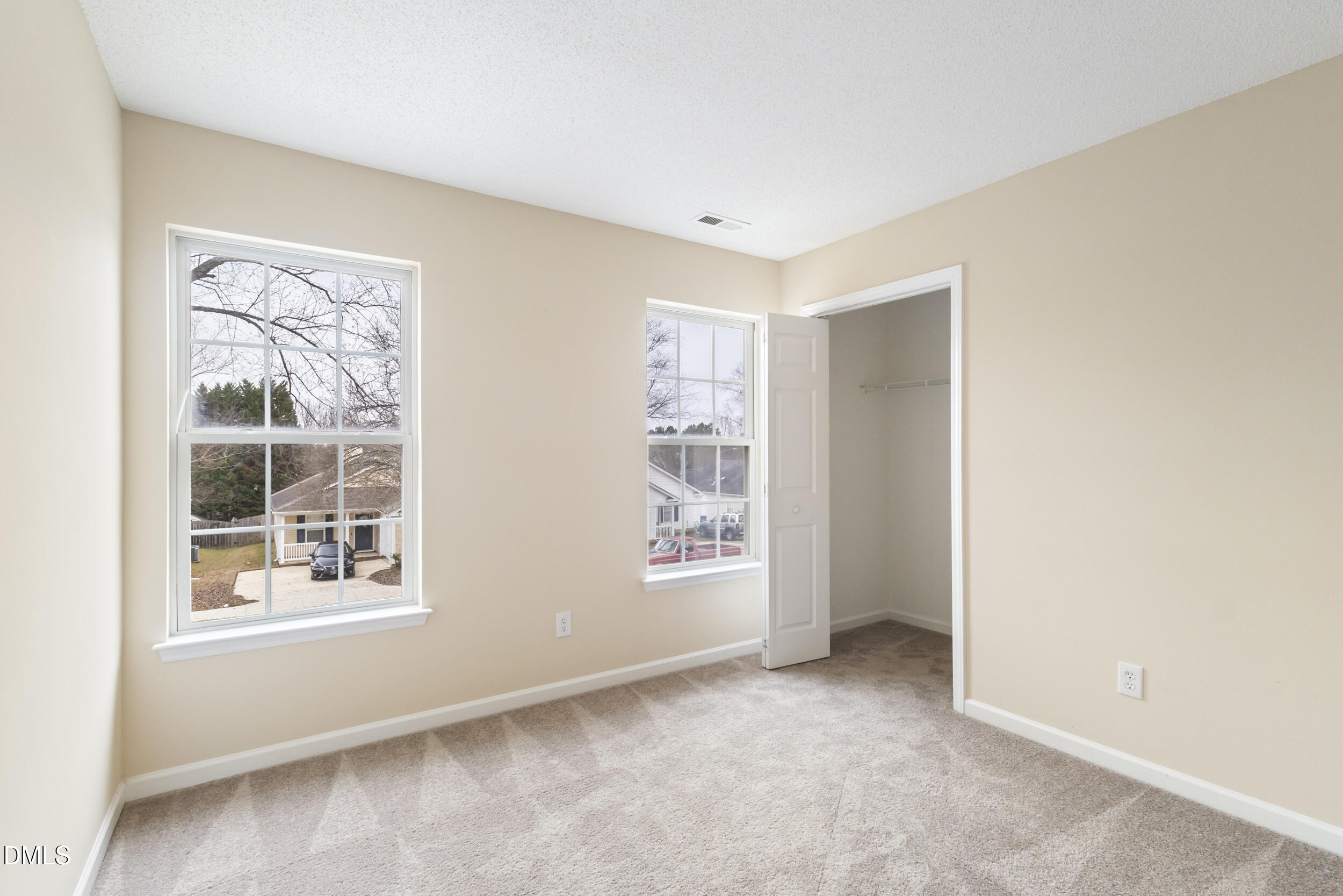 4616 Silverdene Street Raleigh, NC 27616 - Photo 20 of 42 a view of an empty room with a window