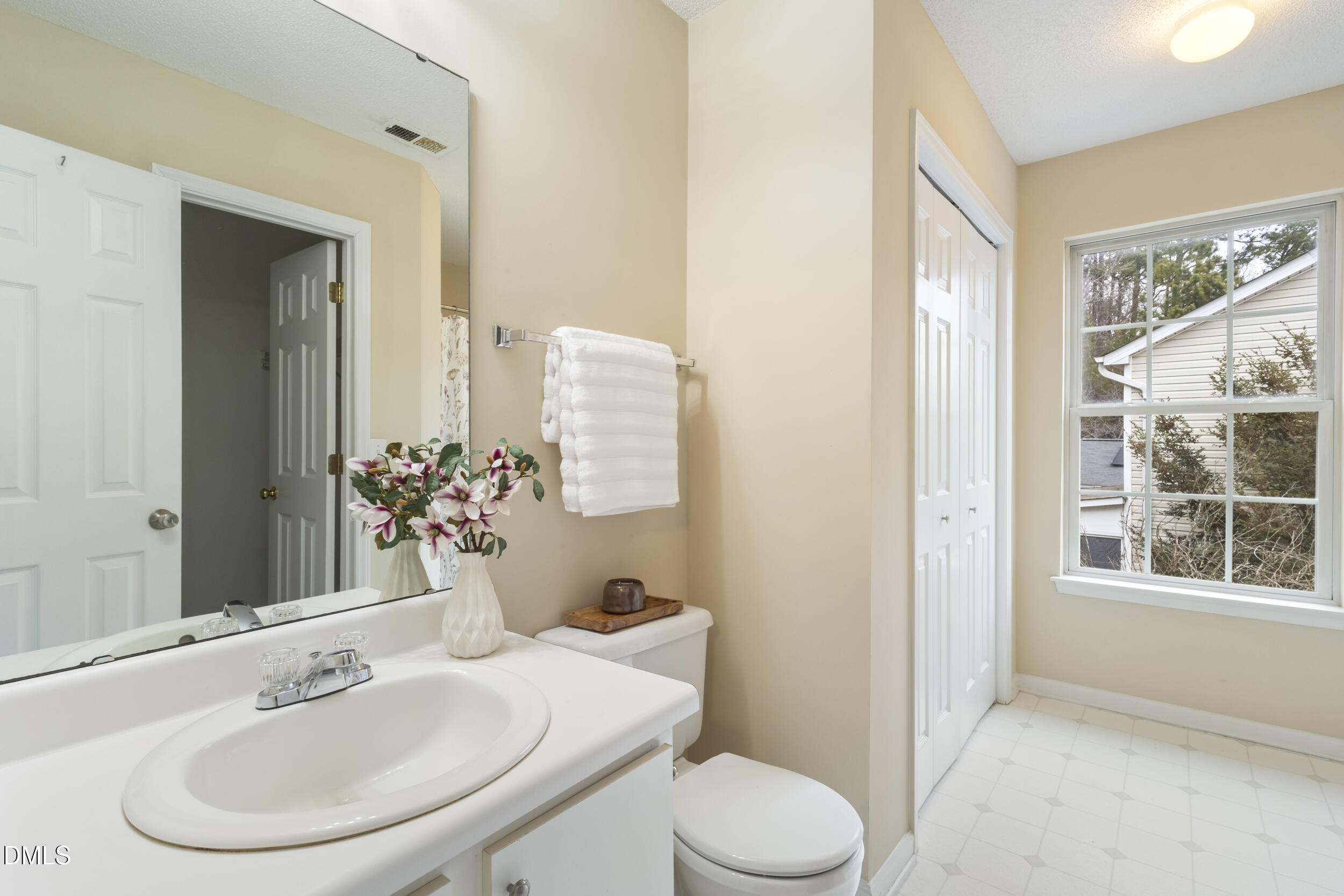 4616 Silverdene Street Raleigh, NC 27616 - Photo 26 of 42 a bathroom with a sink a toilet and shower