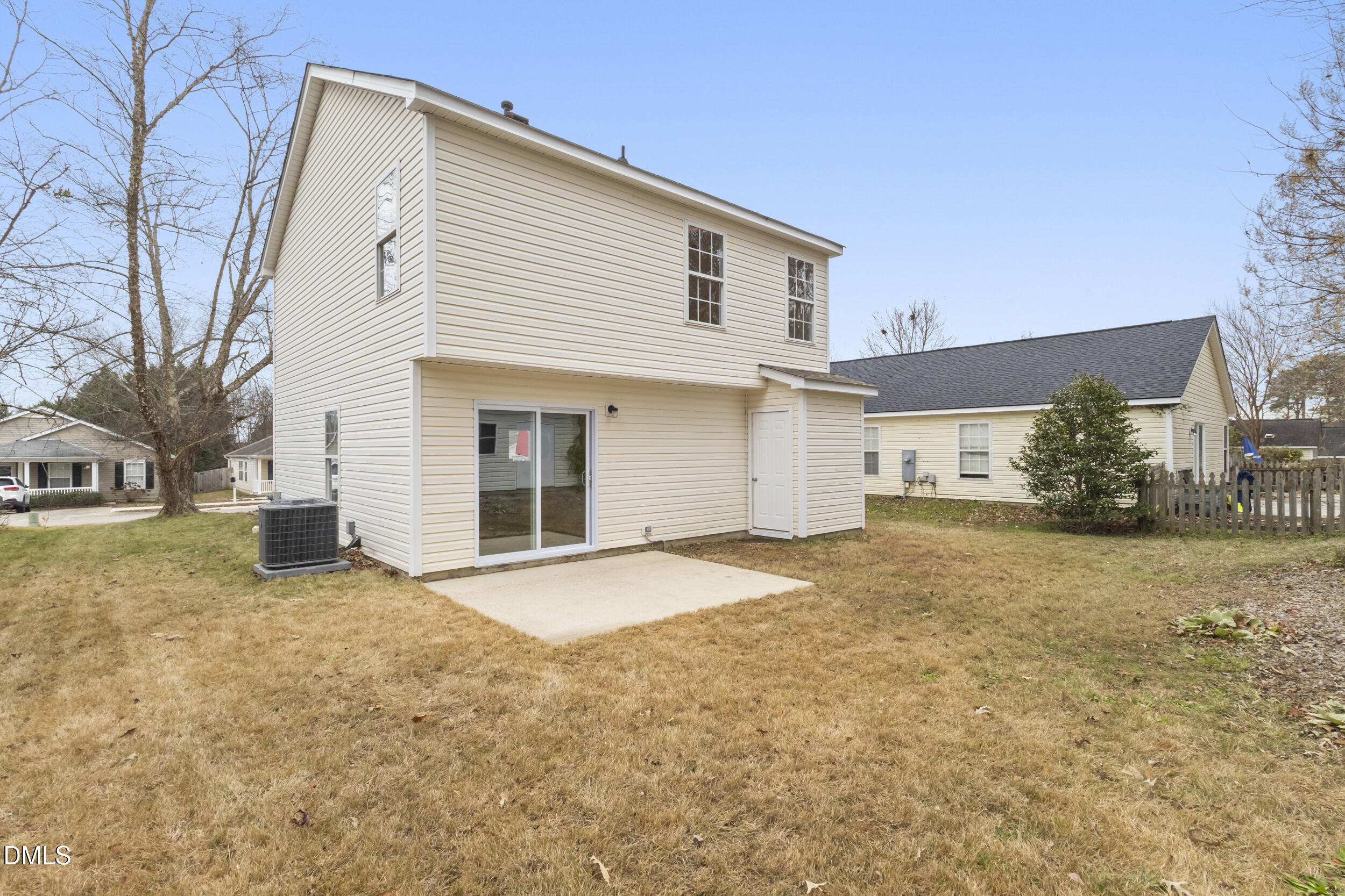 4616 Silverdene Street Raleigh, NC 27616 - Photo 32 of 42 a view of a house with a yard and garage