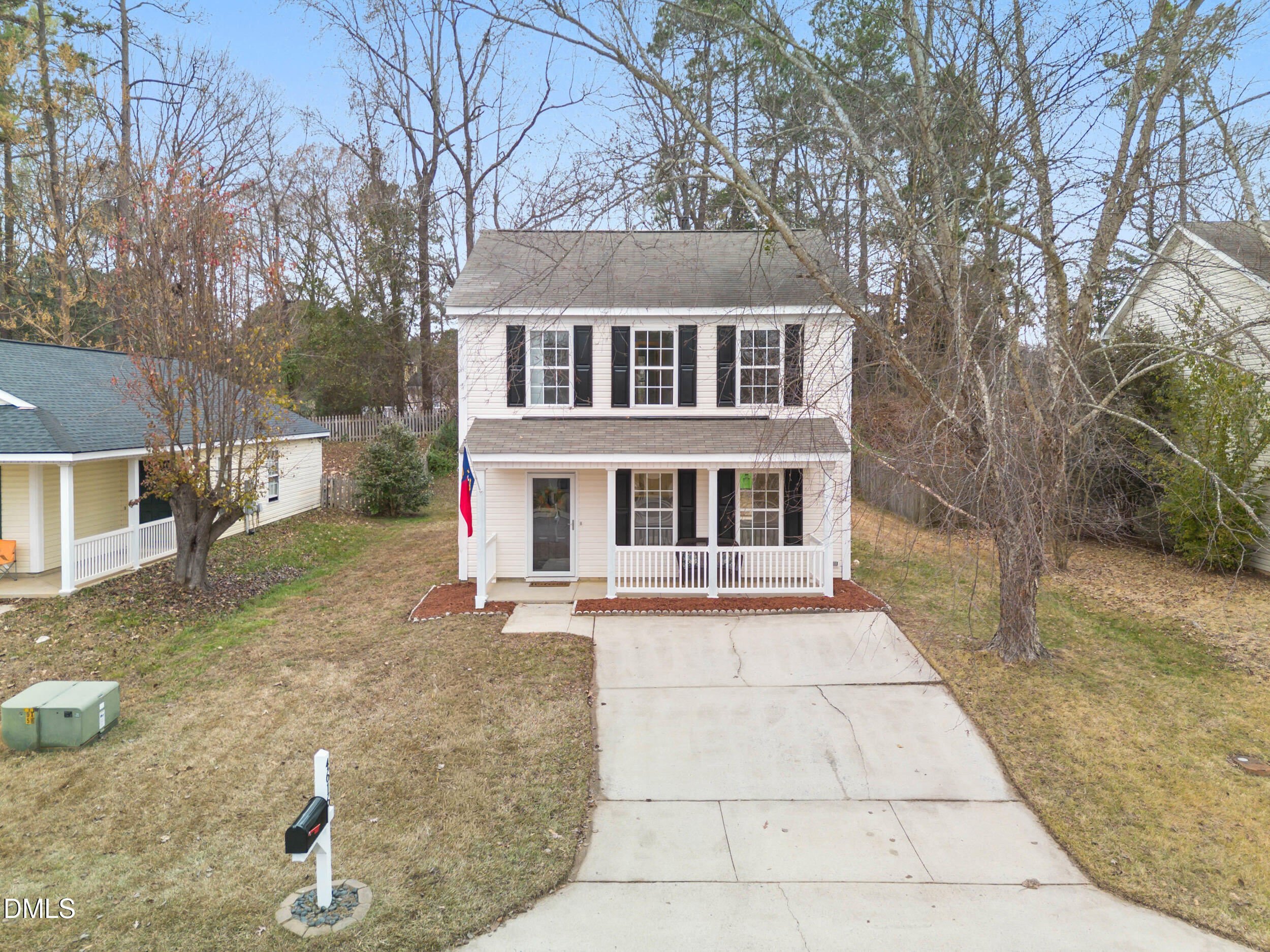 4616 Silverdene Street Raleigh, NC 27616 - Photo 35 of 42 a front view of a house with a yard