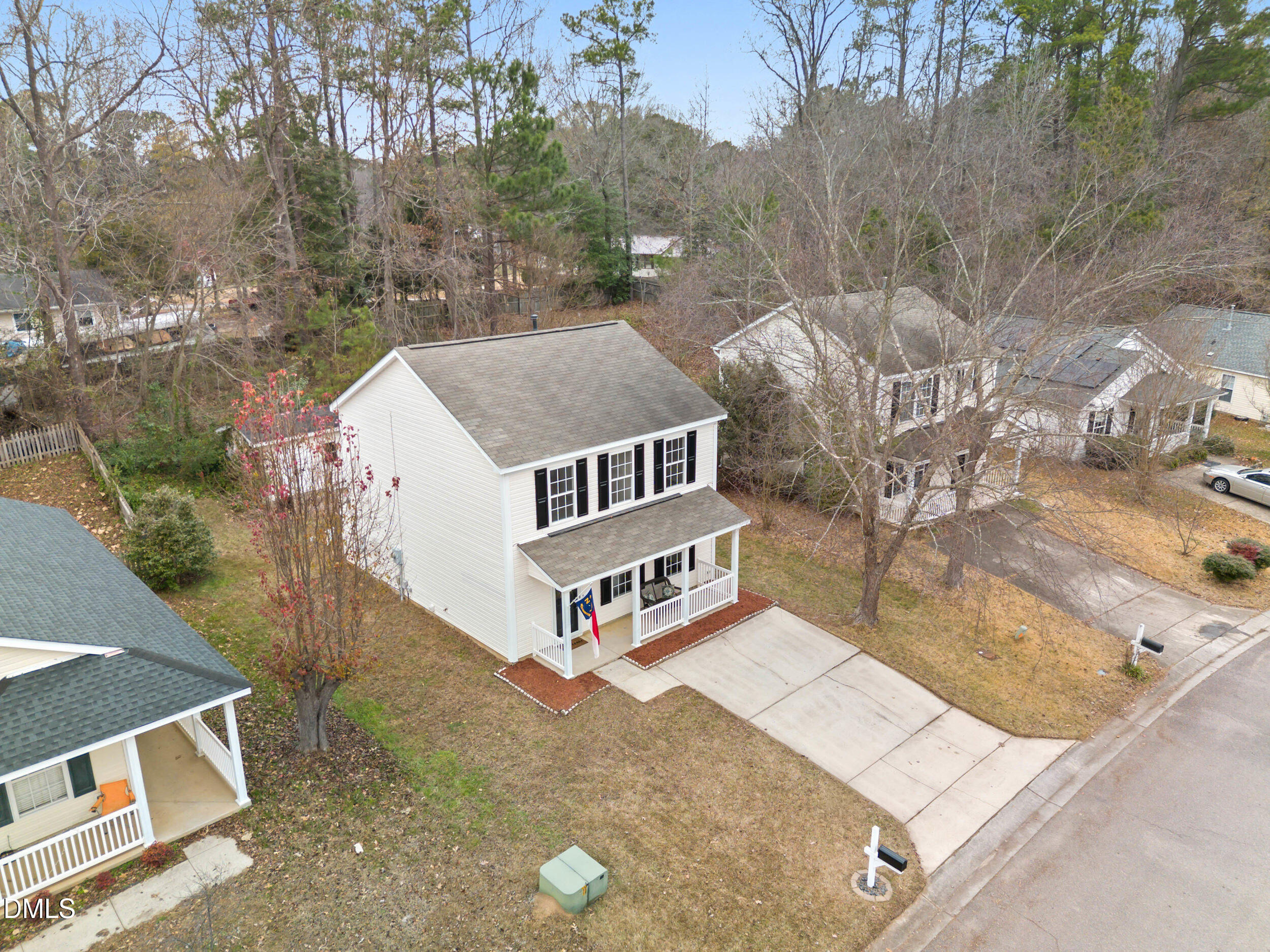 4616 Silverdene Street Raleigh, NC 27616 - Photo 36 of 42 an aerial view of a house with large trees