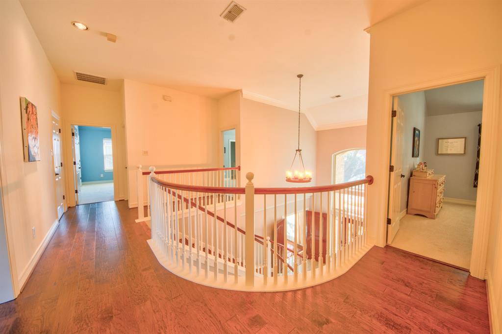730 East Peninsula Drive Coppell, TX 75019 - Photo 12 of 34 a view of entryway with wooden floor