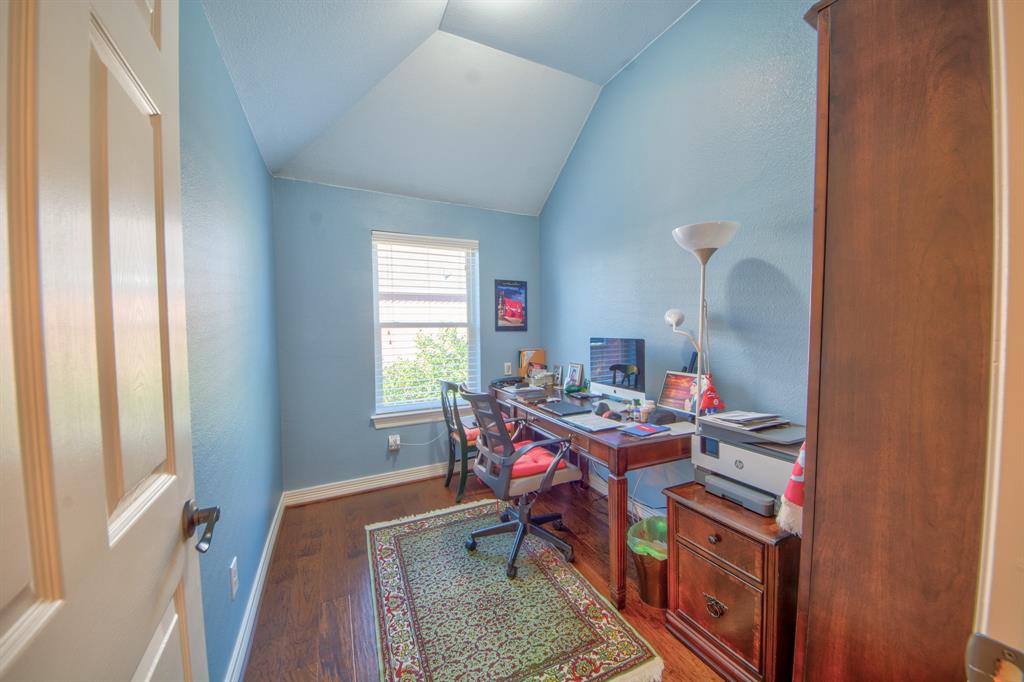 730 East Peninsula Drive Coppell, TX 75019 - Photo 18 of 34 a workspace with furniture and a window