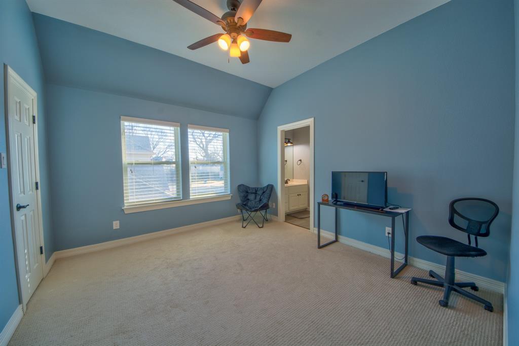 730 East Peninsula Drive Coppell, TX 75019 - Photo 20 of 34 a living room with furniture and a window