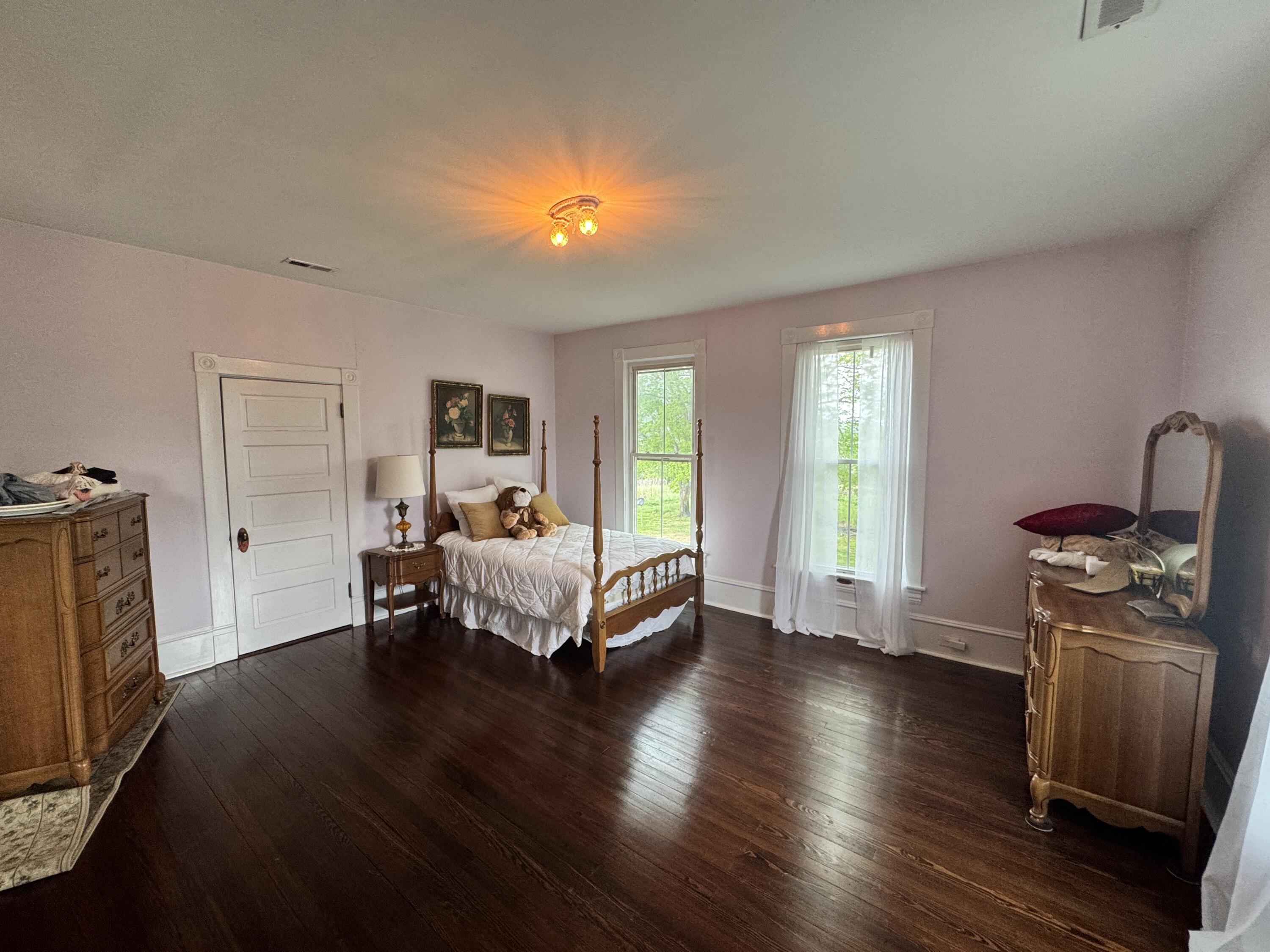 17749 Main Street Buchanan, VA 24066 - Photo 12 of 58 a bedroom with furniture and a window