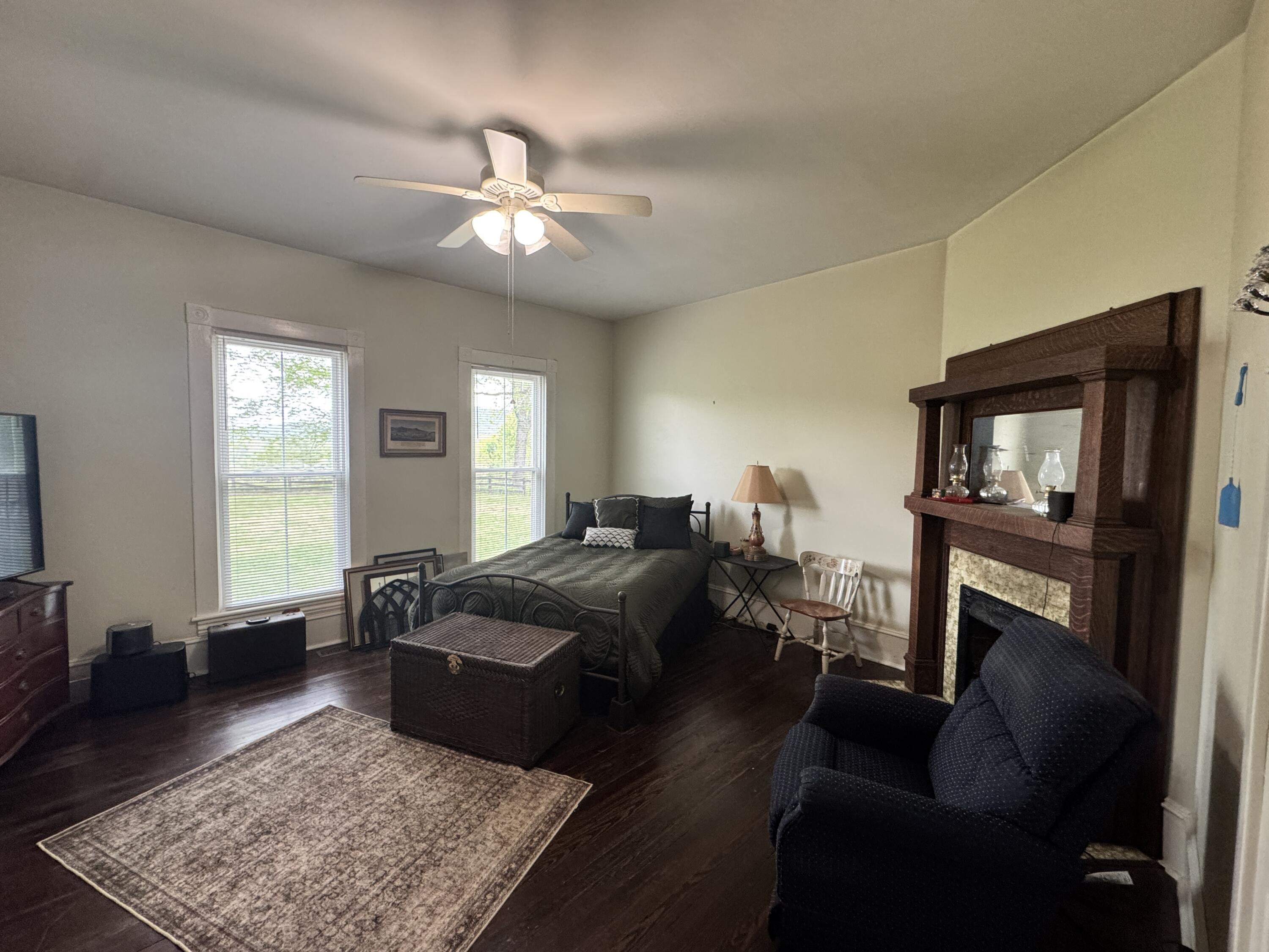 17749 Main Street Buchanan, VA 24066 - Photo 15 of 58 a living room with furniture and a flat screen tv