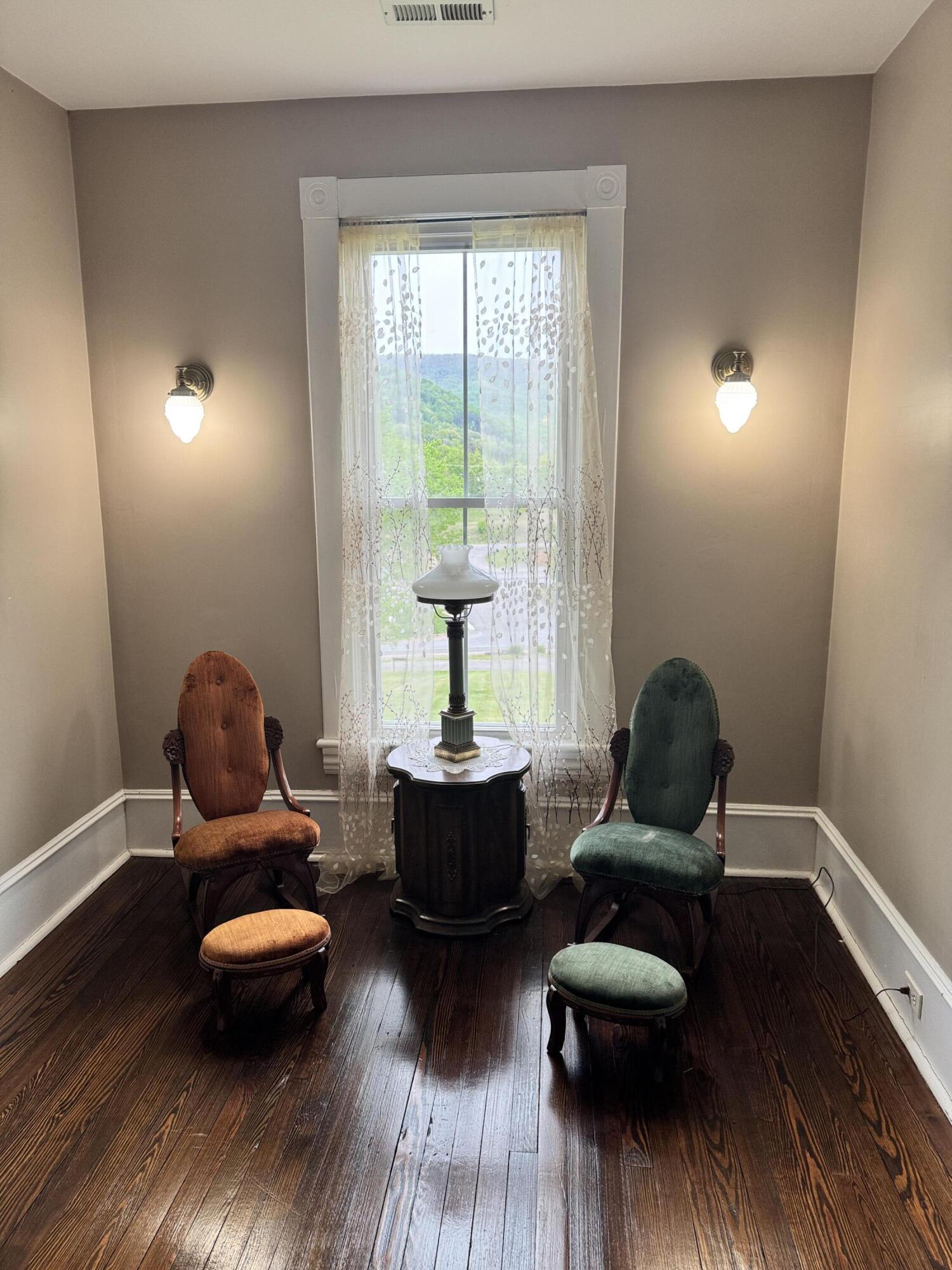 17749 Main Street Buchanan, VA 24066 - Photo 16 of 58 a living room with furniture and a wooden floor