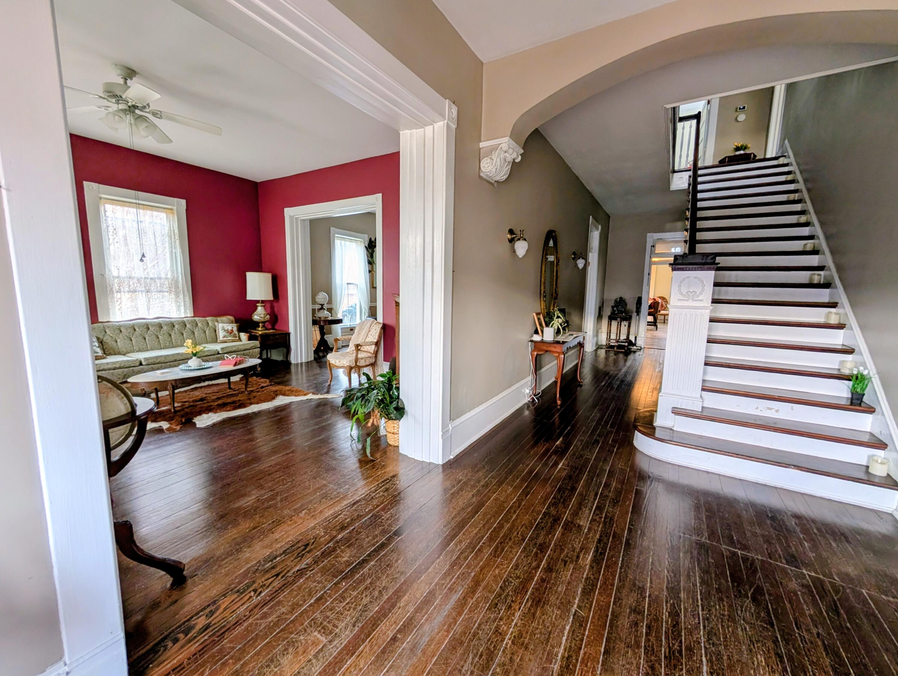 17749 Main Street Buchanan, VA 24066 - Photo 27 of 58 a hallway with wooden floor and furniture