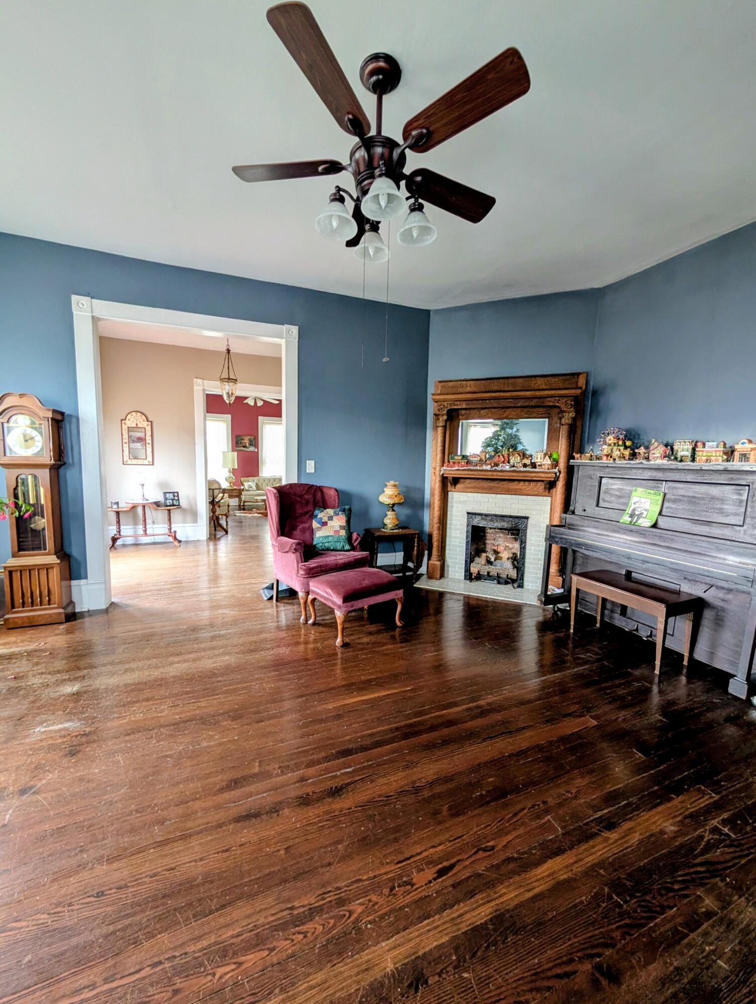17749 Main Street Buchanan, VA 24066 - Photo 28 of 58 a living room with furniture and a fireplace
