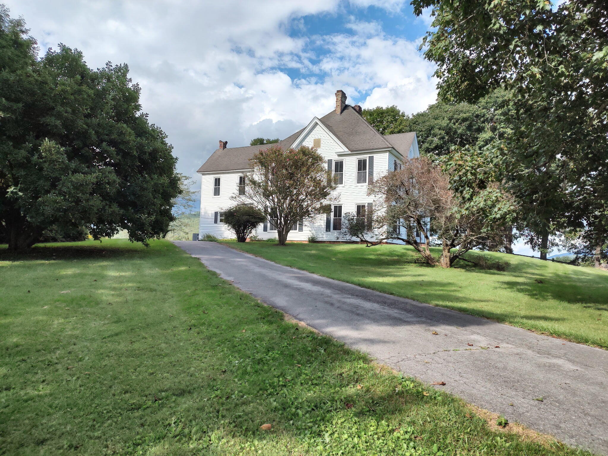 17749 Main Street Buchanan, VA 24066 - Photo 37 of 58 a front view of a house with a yard