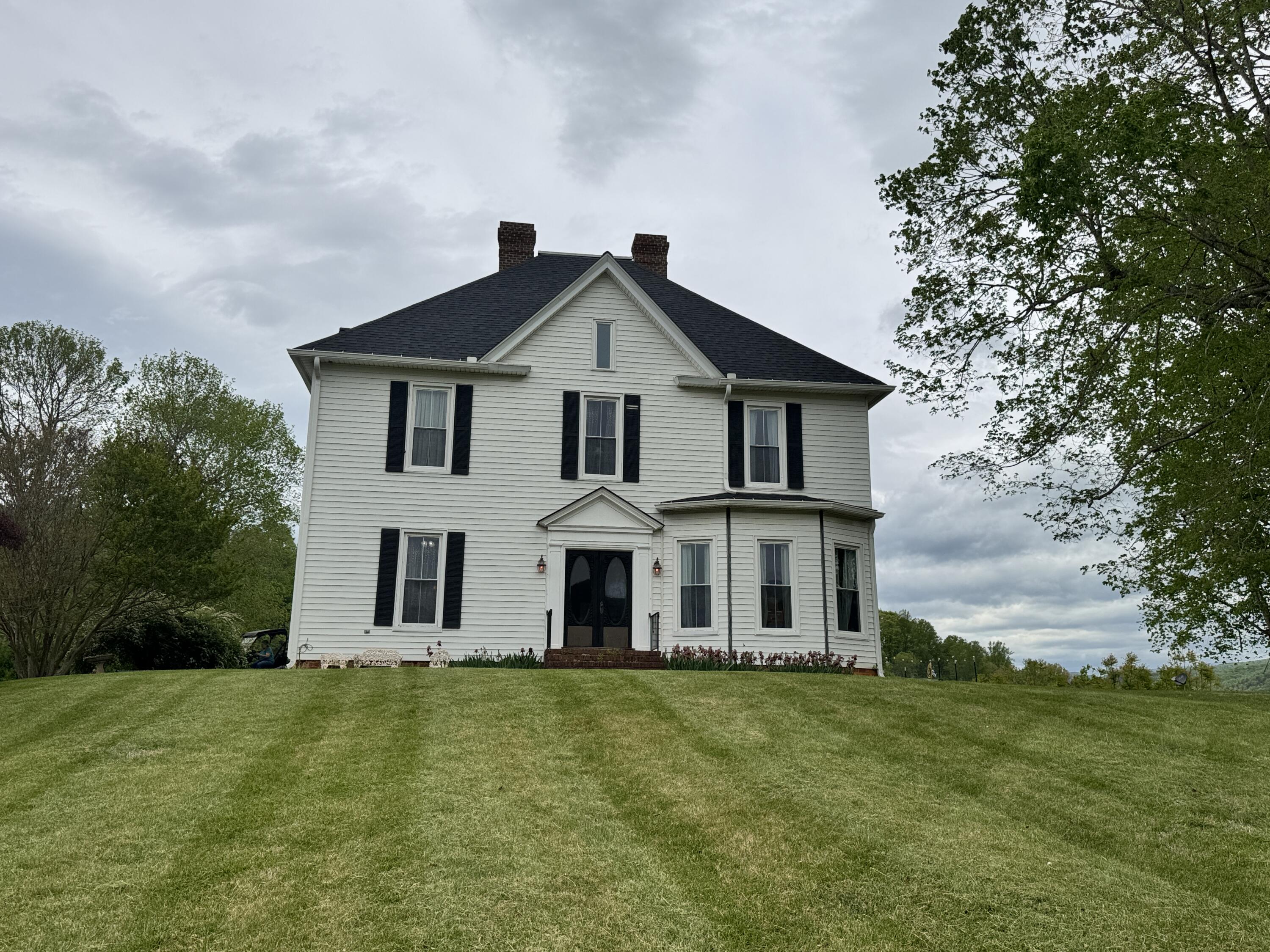 17749 Main Street Buchanan, VA 24066 - Photo 57 of 58 front view of house with a yard
