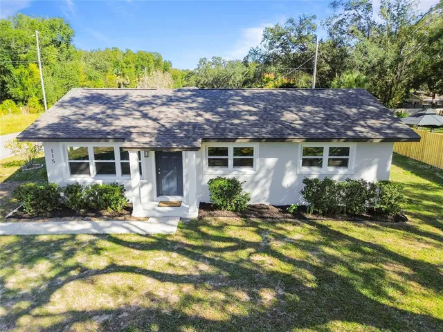 a house view with a garden space