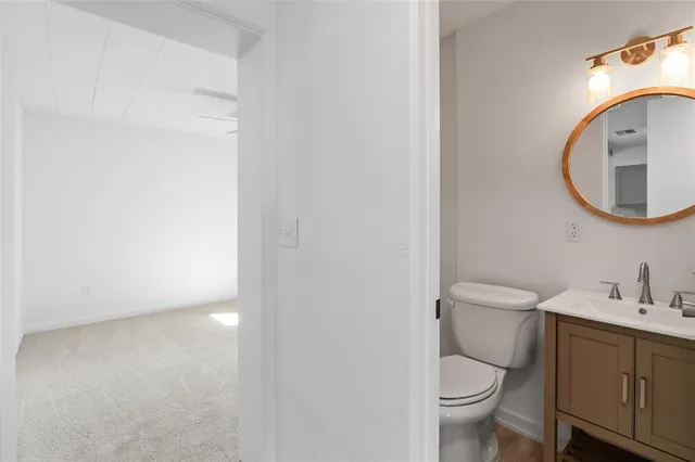 a bathroom with a toilet and a sink