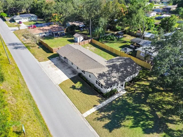 a view of a house with a swimming pool