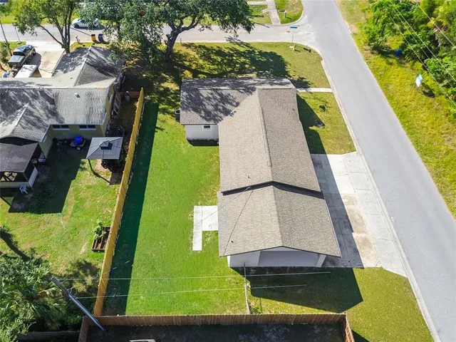 a view of swimming pool with a yard