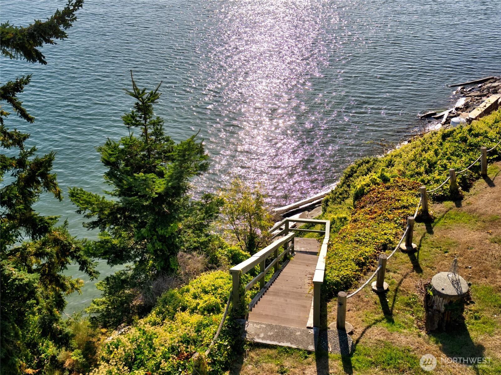 6860 Salmon Beach Road Anacortes, WA 98221 - Photo 18 of 40 a view of a house with a yard